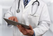 doctor with tablet