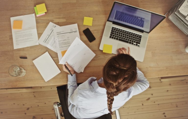 HR compliance woman at desk