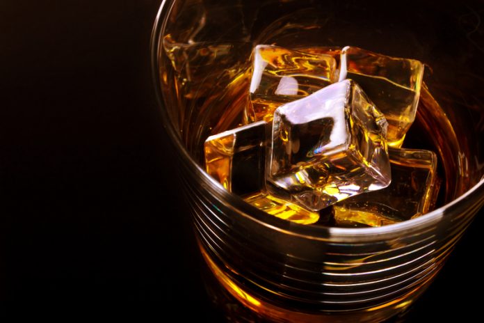 whisky glass alcoholic liver disease concept