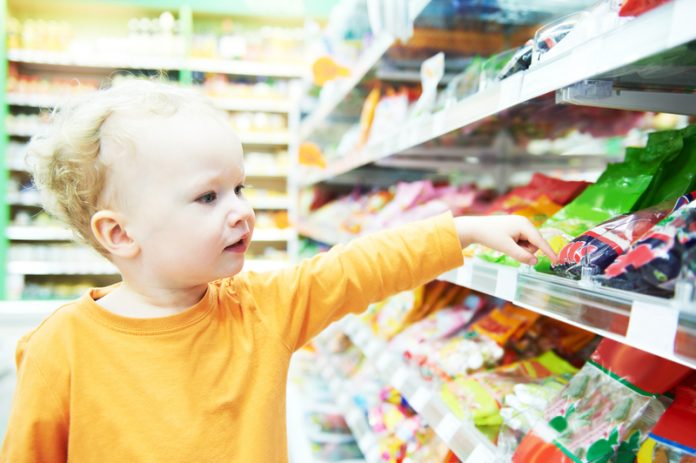 obesity in children sweets in shop