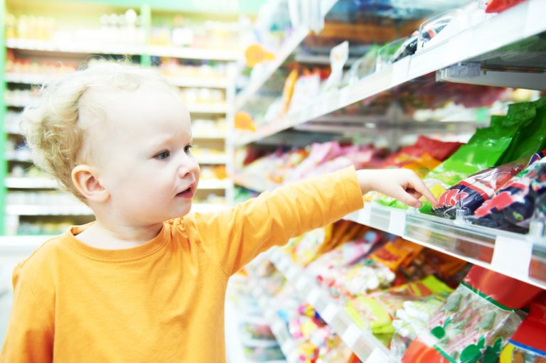 obesity in children sweets in shop
