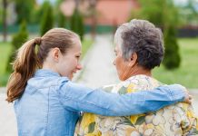 Old and young woman make personal budgets dementia friendly