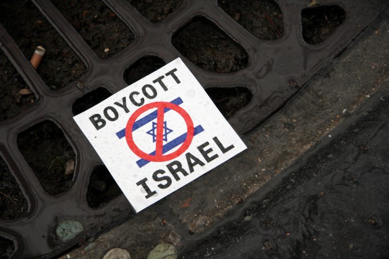 council boycotts israel sign on floor