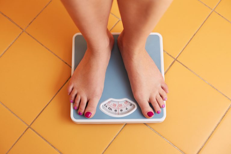 obesity epidemic and cancer woman scales
