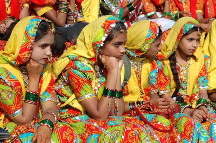 PUSHKAR, INDIA - NOVEMBER 21: Rajasthani girls are preparing to global period poverty, vulnerable women and girls