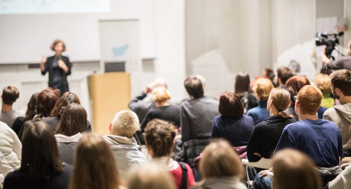 University leader giving a lecture to students