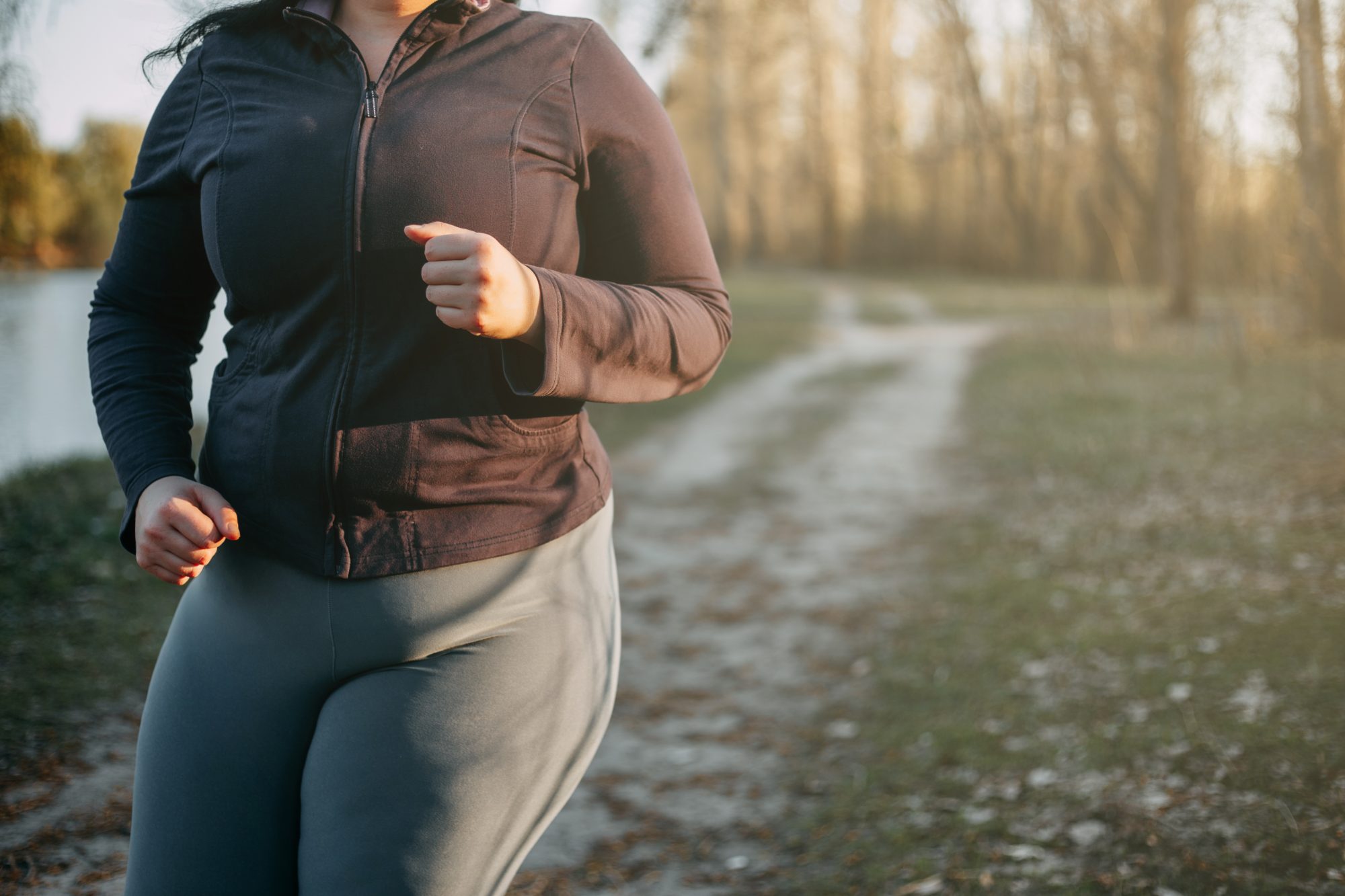 Woman jogging in effort to lose weight 