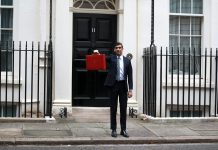 Rishi Sunak standing outside No. 10 Downing Street