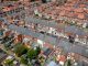 Aerial view of rows of terraced houses in the North of England indicating levelling up