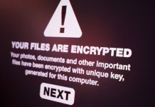 Computer message from ransomware hacker stating 'YOUR FILES ARE ENCRYPTED'