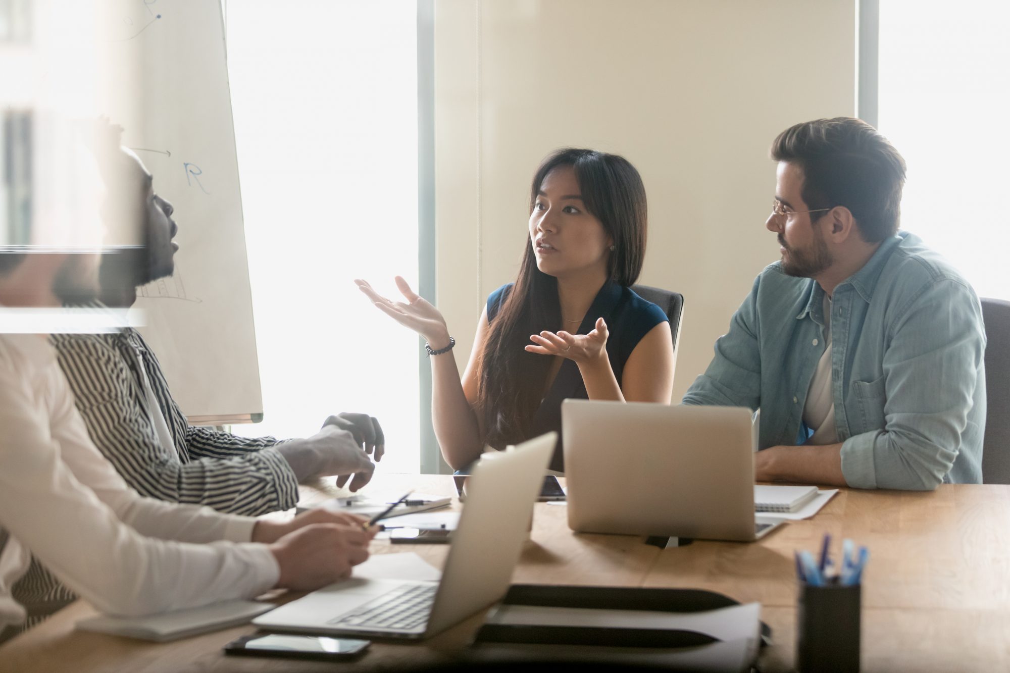 Employees talking in the office