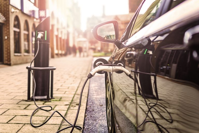 Electric Vehicle charging on street for carbon net-zero emissions, in UK