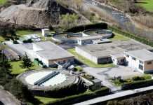 A water treatment plant with two treatment ponds viewed from the air