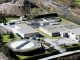 A water treatment plant with two treatment ponds viewed from the air