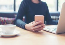 woman looking at her screen with the concept of personal data and digital identity