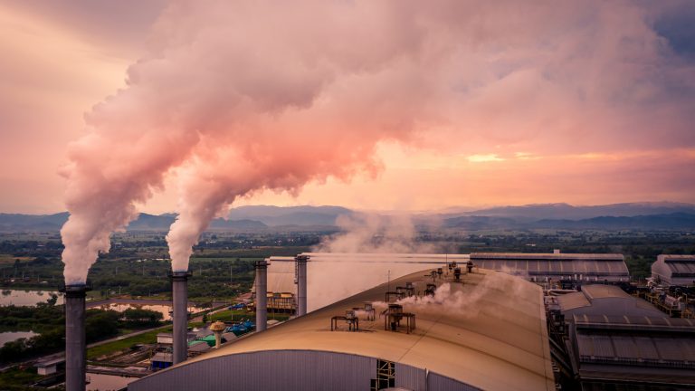 Smokestack pipe factory pollution in the city, Fuel Power Plant Smokestacks Emit Carbon Dioxide Pollution