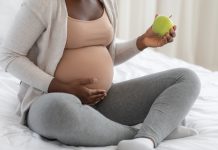 Pregnant woman eating food