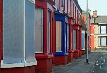 A street of boarded up derelict houses in Liverpool