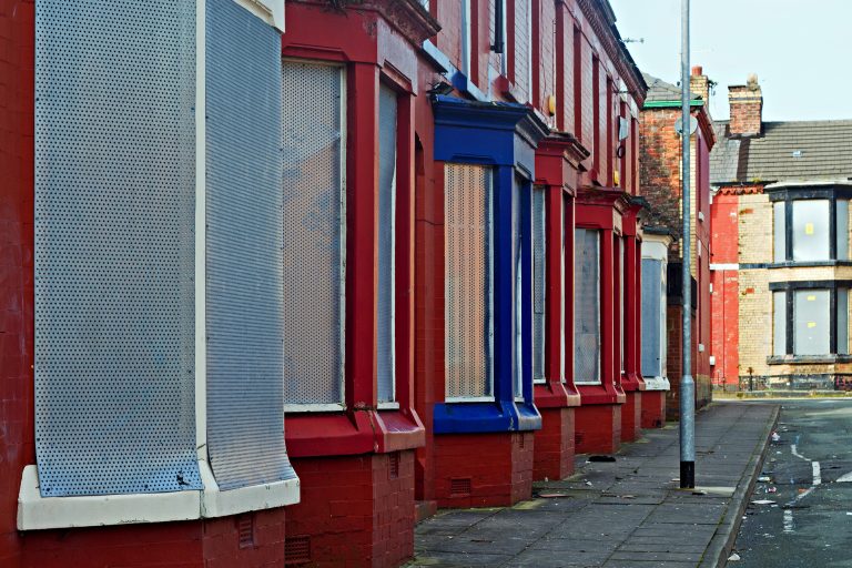 A street of boarded up derelict houses in Liverpool