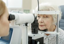 woman having an eye test done at the optician