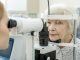 woman having an eye test done at the optician