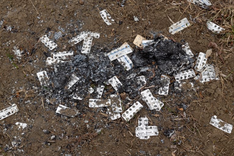 Blister packs on floor left over from methamphetamine manufacturing