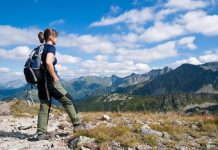 Young woman hiking in mountains