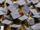 A group of graduating student wearing caps.