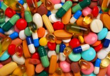 Pile of pills, new drug development - Acoustic Cluster Therapy