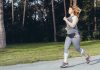 Caucasian woman wearing gym clothes running in order to lose weight