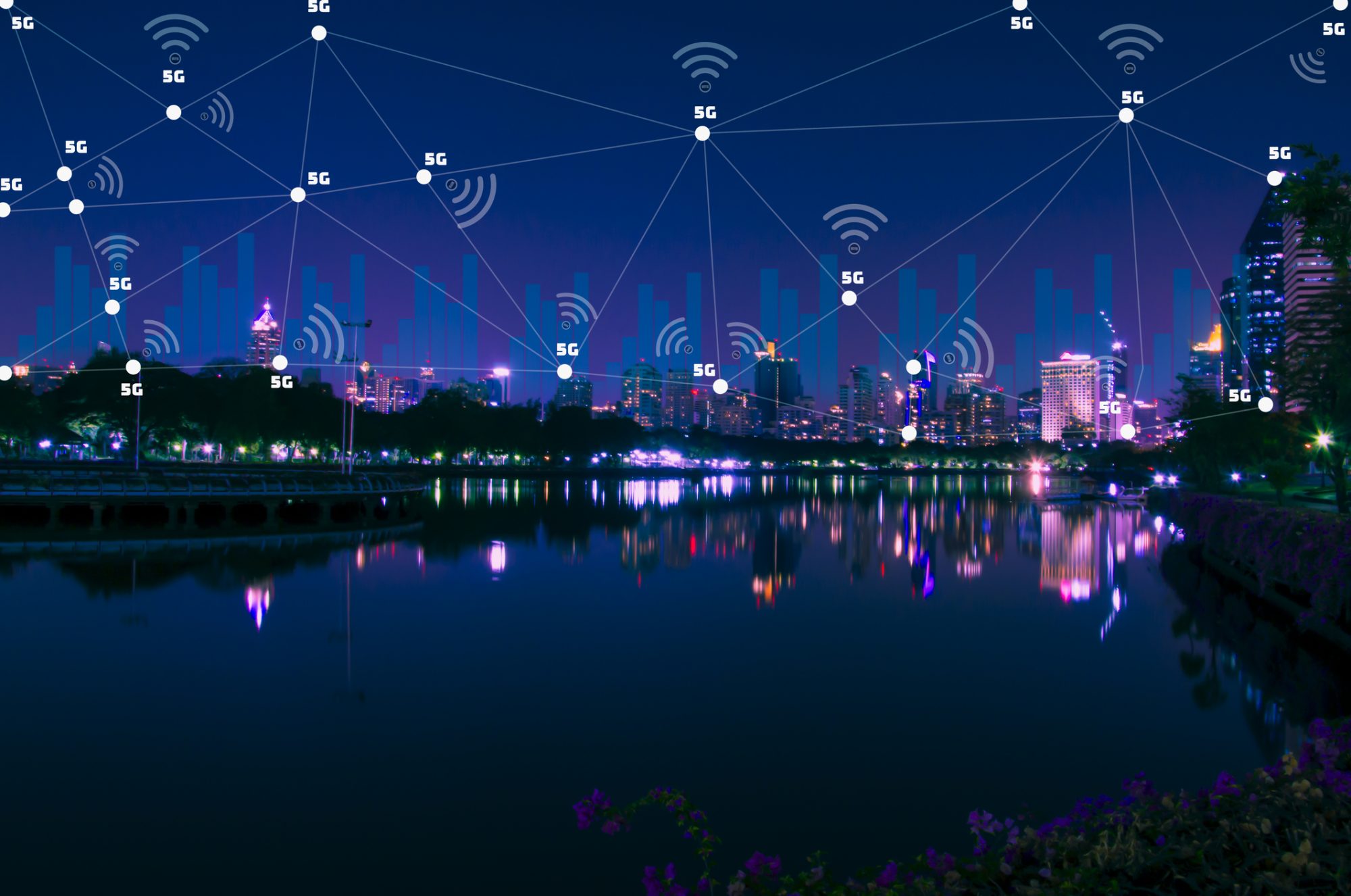 Night view of smart city, with 5G network and wifi symbol cover area urban, concept of futuristic fast communication and modern