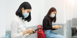 Two female college students wearing masks