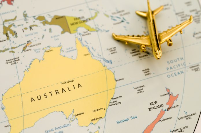Plane Traveling Over Australia and New Zealand