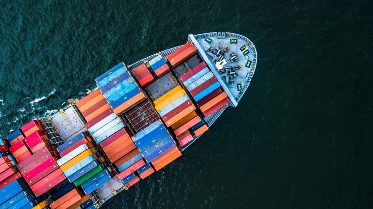 Aerial top view crane shipping container, cargo container ship carrying container import and export business logistic and transportation