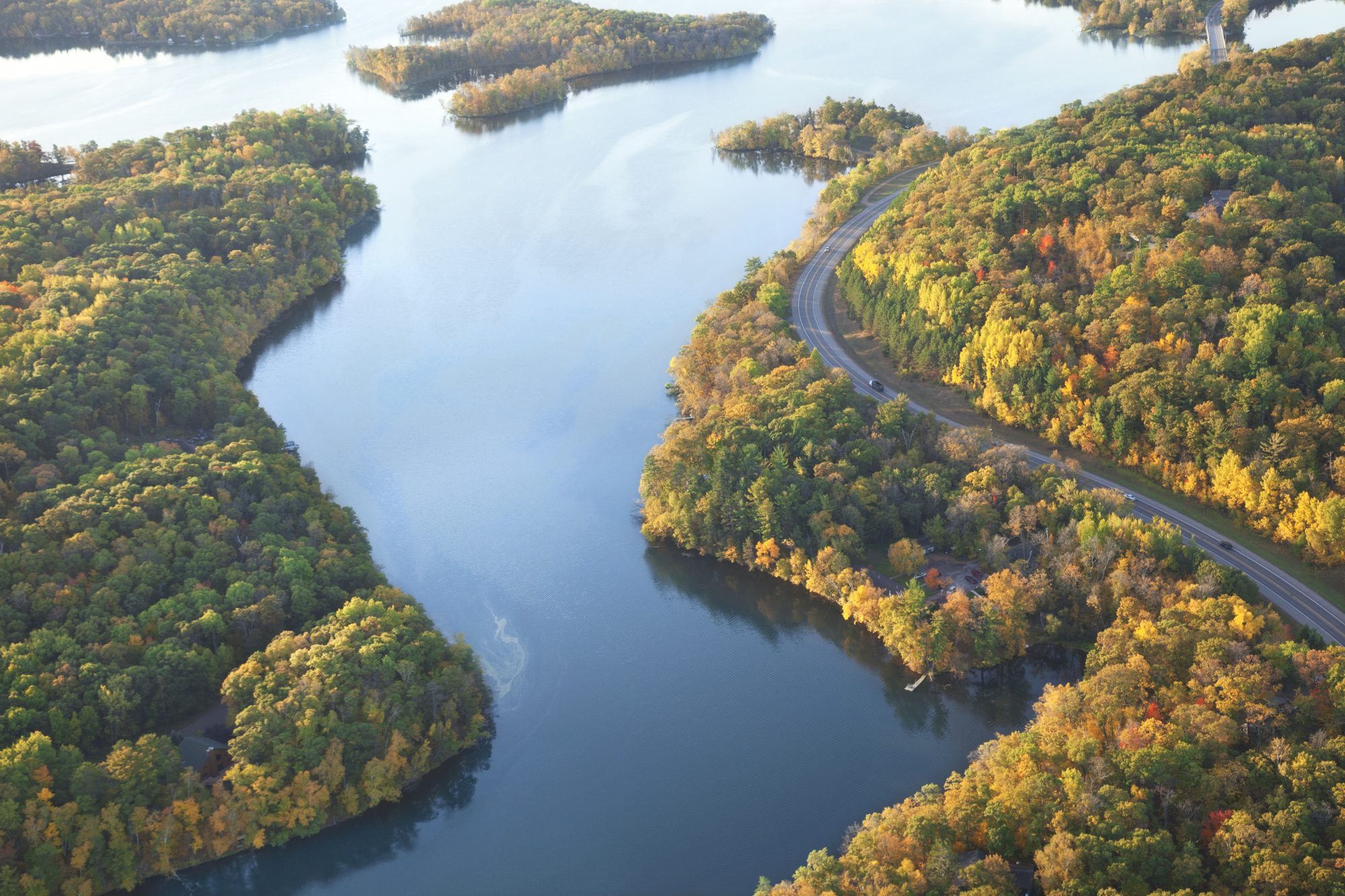 Curving road along the Mississippi River near Brainerd, Minnesota in the autumn