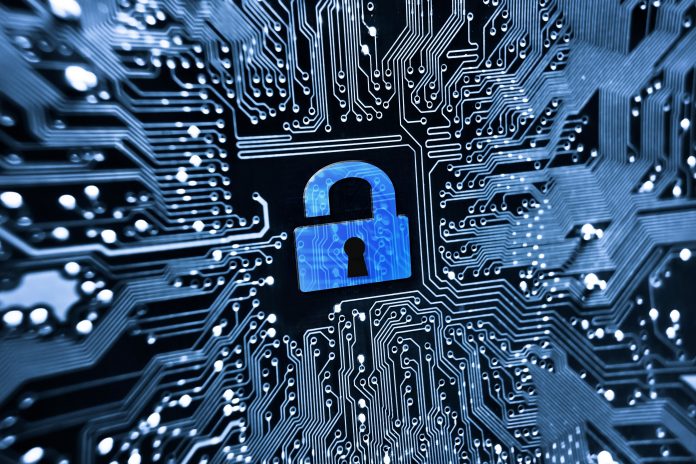 Security lock symbol on computer circuit board