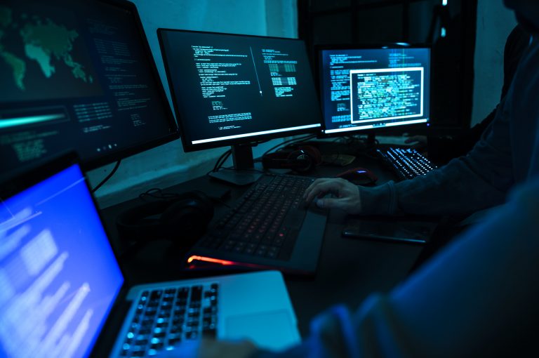 Hacker working on computer cyber crime