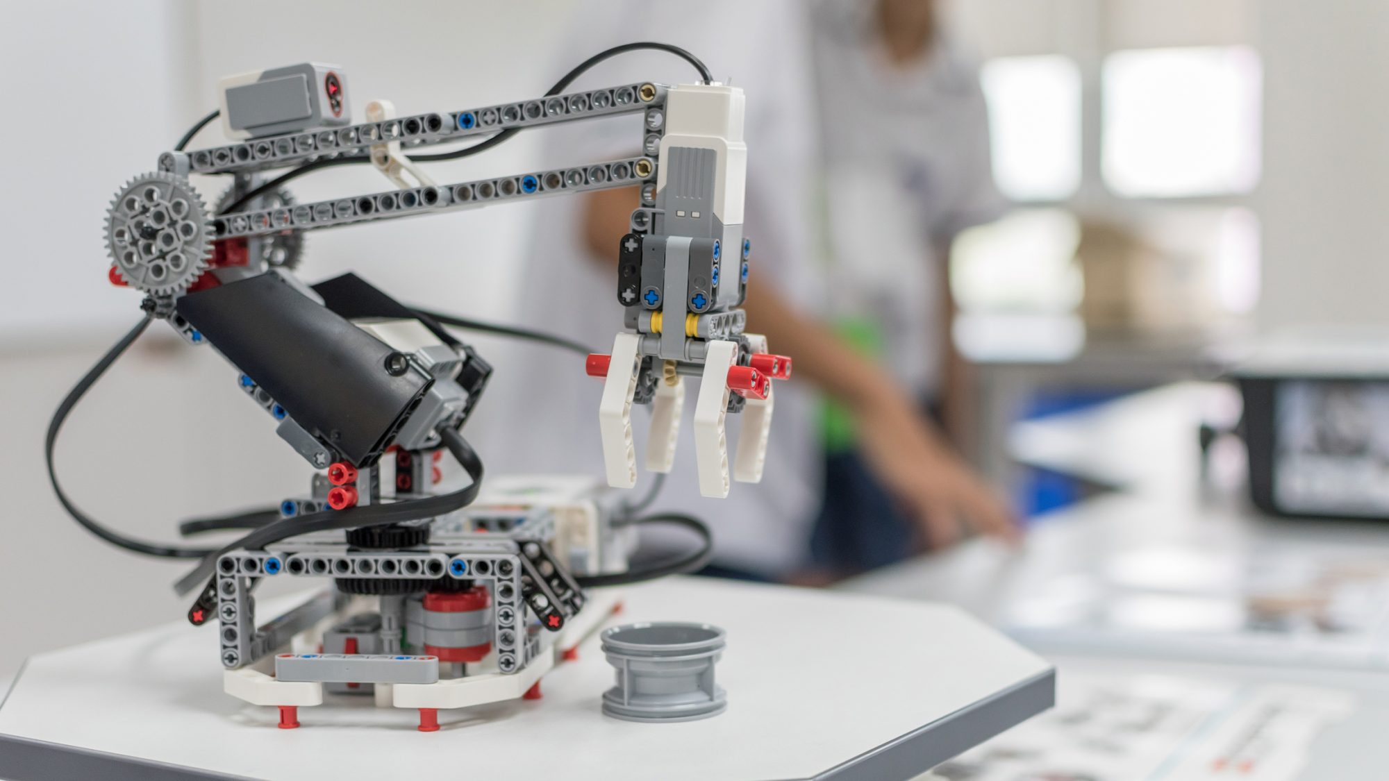 Robotic lab class with school students blur background in AI learning or group study workshop in science technology engineering