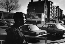 Brenda Agard, Black British photographer on a photo shoot in London, 1987. Agard was instructing students on street photography. The workshop was part of the educational programming for the exhibit "Testimony: Three Blackwomen Photographers: Brenda Agard, Ingrid Pollard, Maud Sulter" at Camerawork London.