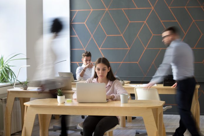 Office rush concept, employees working together in coworking