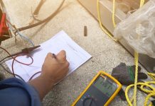 Engineer checking or inspection insulation resistance measuring for electric wire energy