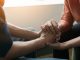 Mental health concept, Psychologist sitting and touch hand young depressed man for encouragement