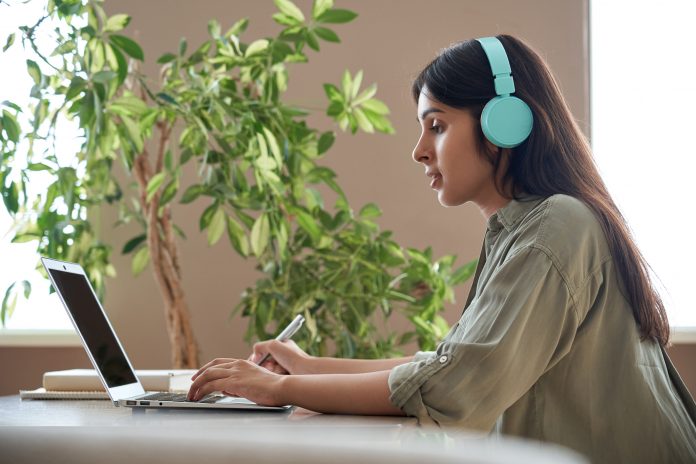 A girl at school in an online learning course