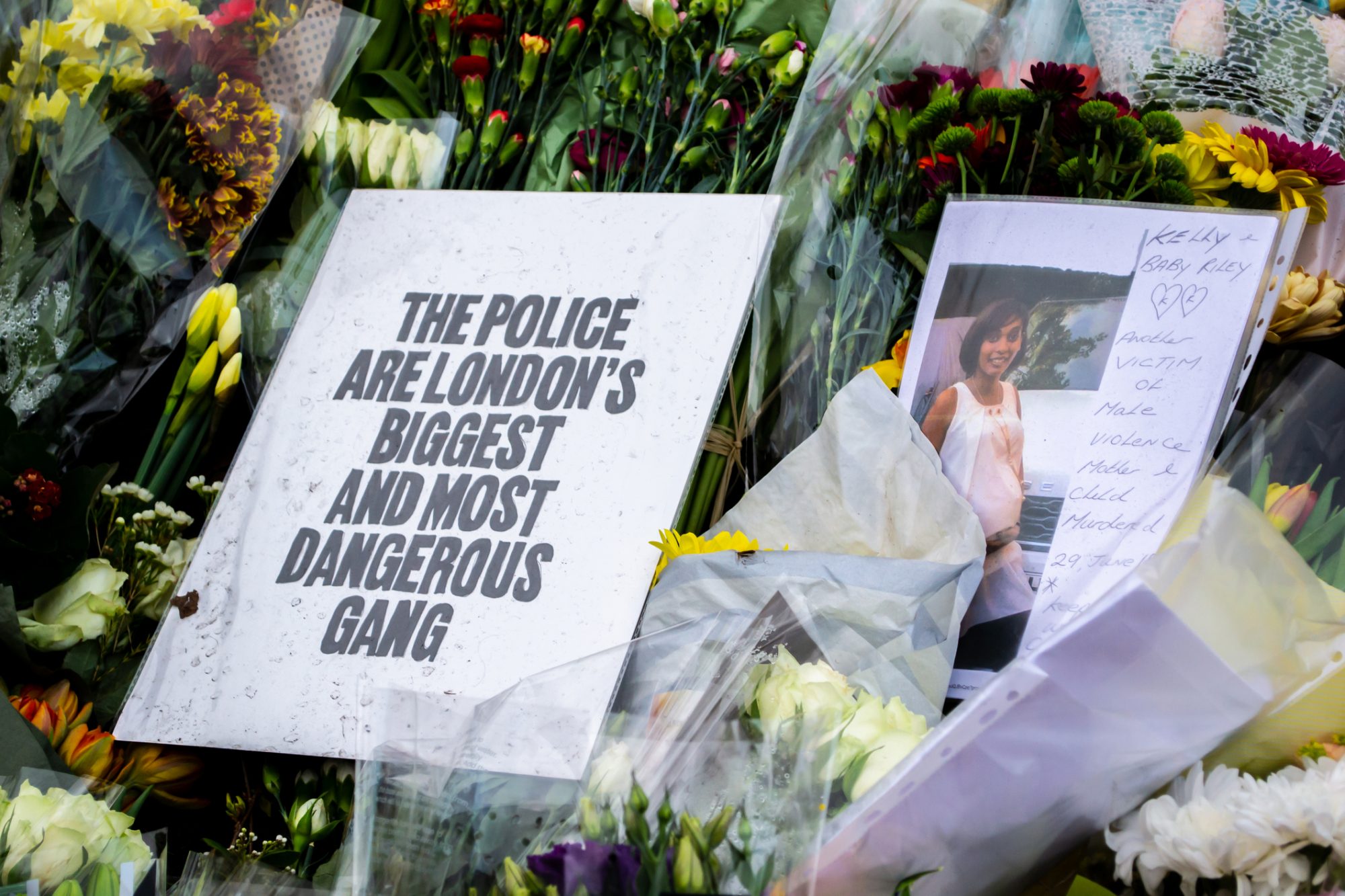 CLAPHAM, LONDON, ENGLAND- 16 March 2021: Flowers and tributes at Clapham Common Bandstand, in memory of Sarah Everard