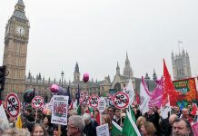 Austerity protesters march on Parliament in opposition to government spending cuts on March 26, 2011 in London, UK. An estimated 250,000 people took part in the TUC organised rally.