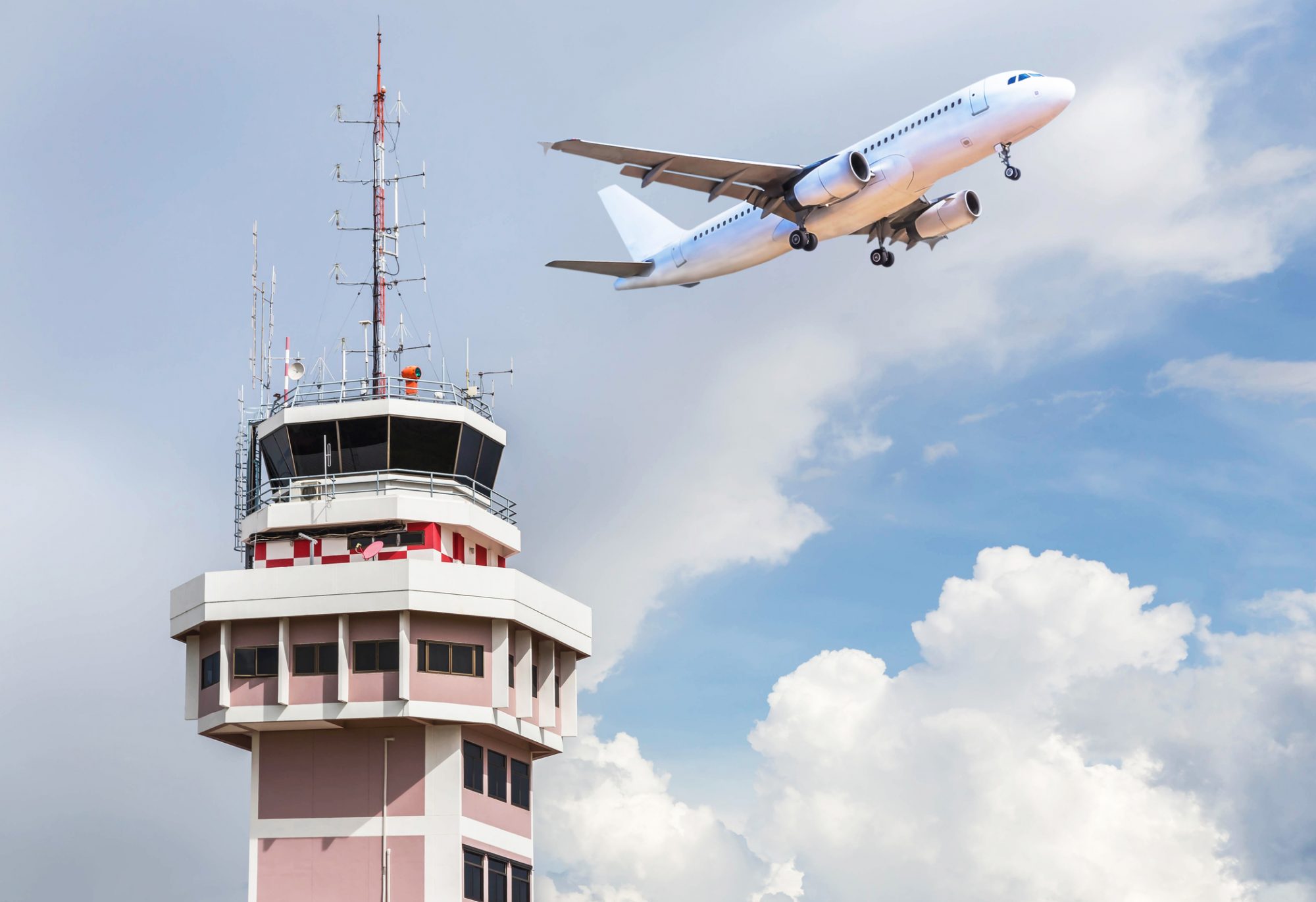 aeroplane passing a traffic management control