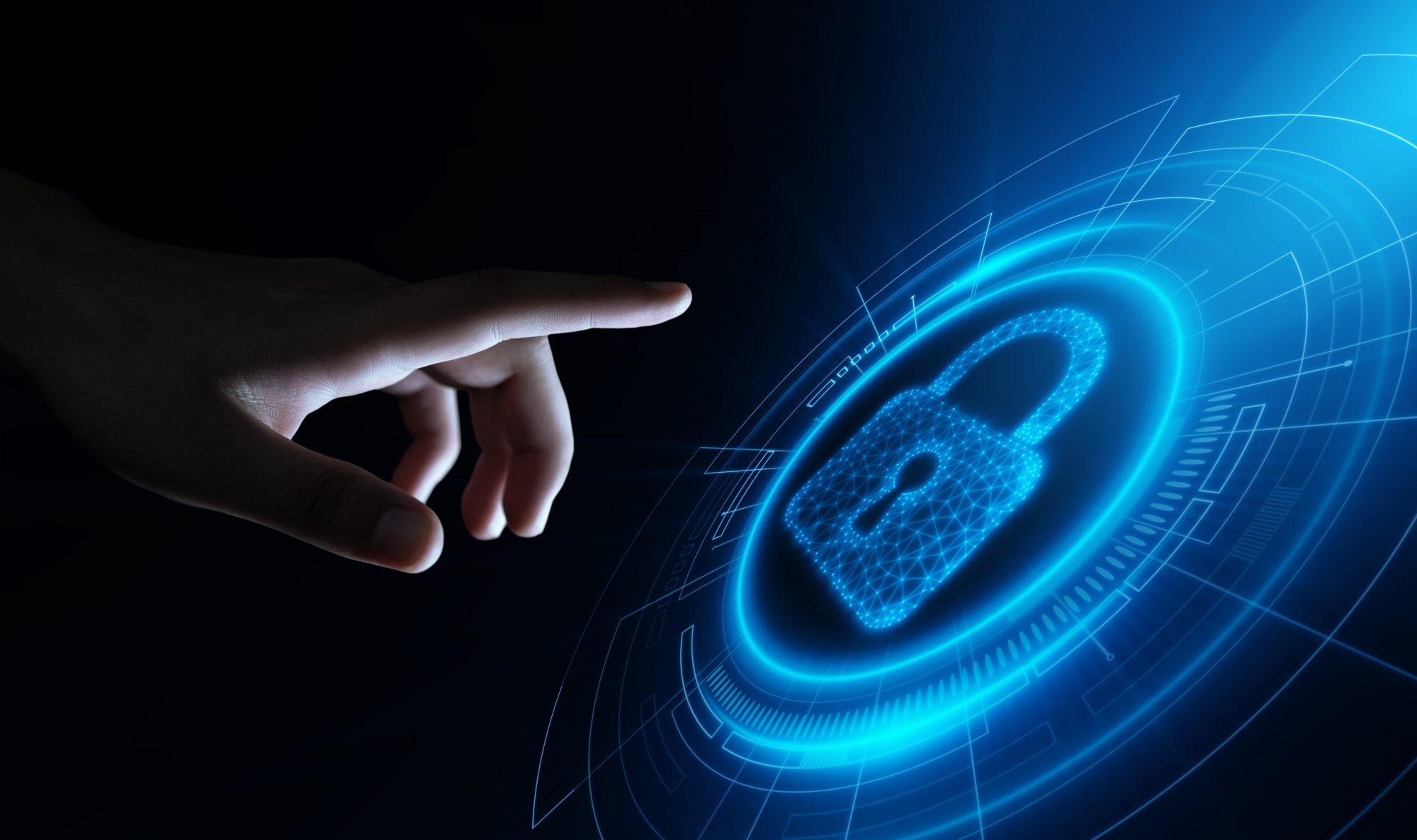 Dark background with person's finger pointed towards blue padlock