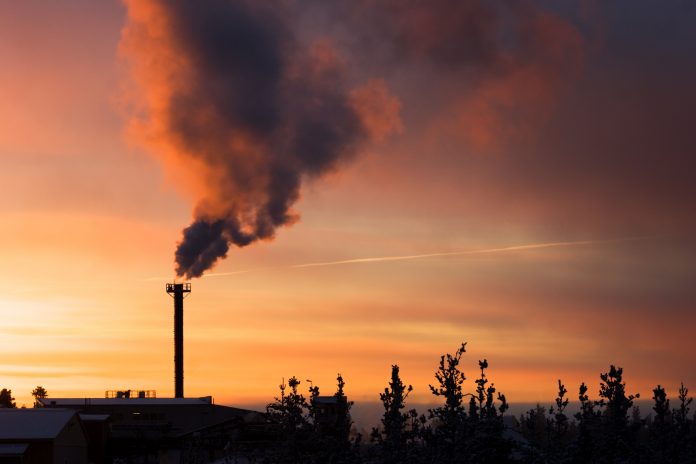 impact business, Global warming concept: smoke coming out of chimney