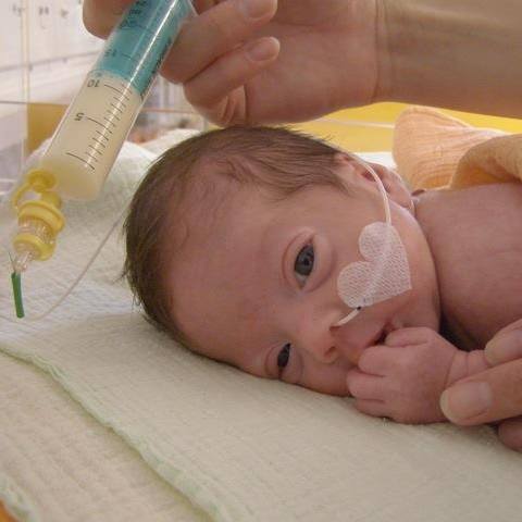 a baby on an IV