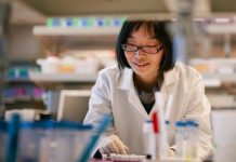 Female Scientist at a engineering lab